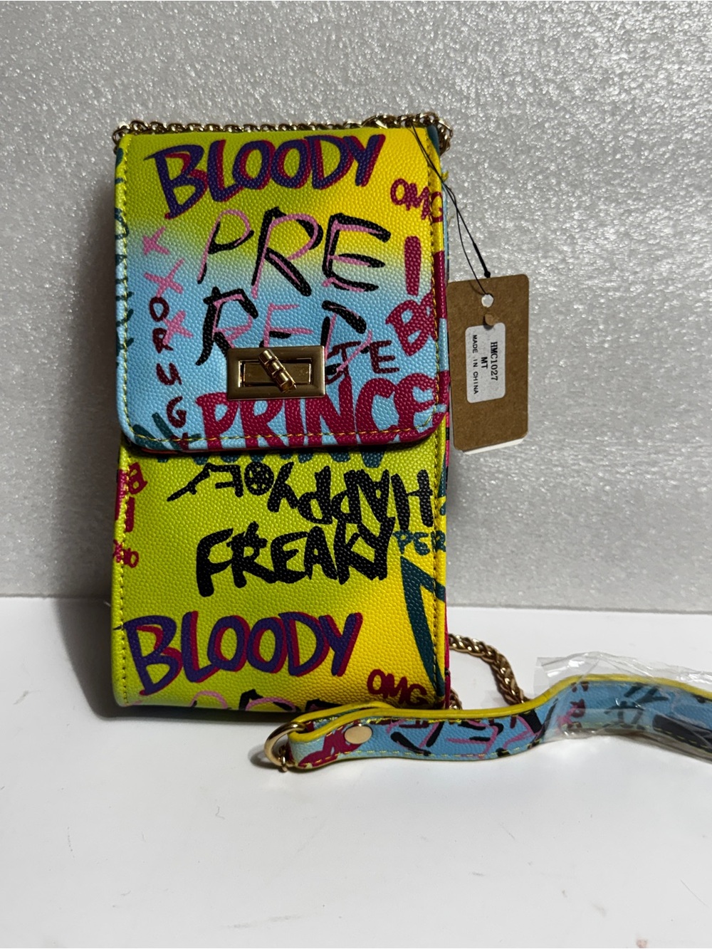 Graffiti Print Crossbody Phone Bag in Yellow & Blue